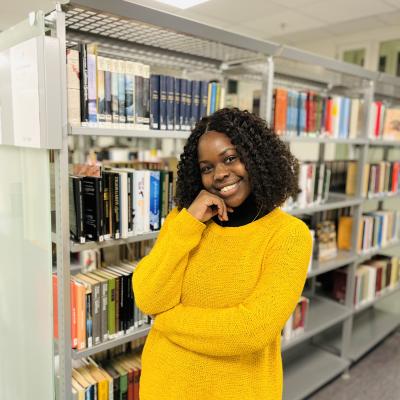 Student standing infront of library - study in Norway
